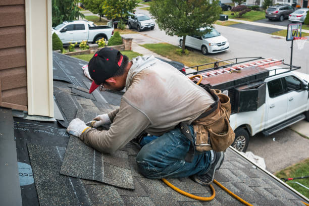 Professional Roofing technician working in Huntington Bay, NY